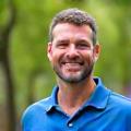 Portrait of Mark Davidson, an active and approachable man with a thoughtful expression.